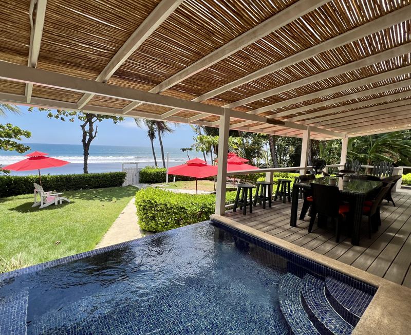Pool and covered deck at The Palm, Beach House, looking out to Playa Hermosa beach